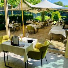Tuin en overdekt terras van Maison Maurice