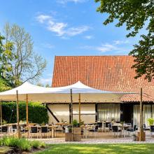 Gevel en terras van De Baenwinning